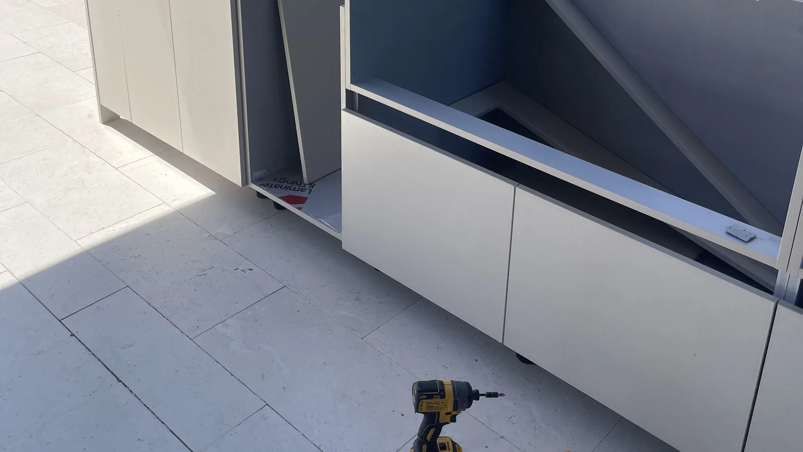 Cabinet boxes shown before fronts and stone are added